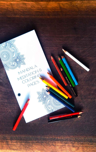 Mandala meditation coloring with colored pencils